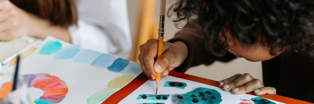 Little boy drawing watermelon