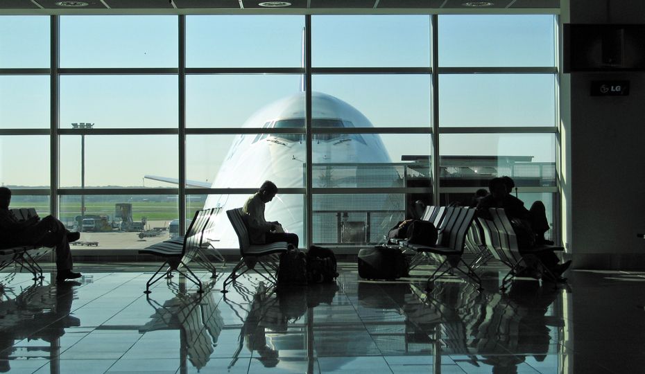 A busy gate waiting area in an airport