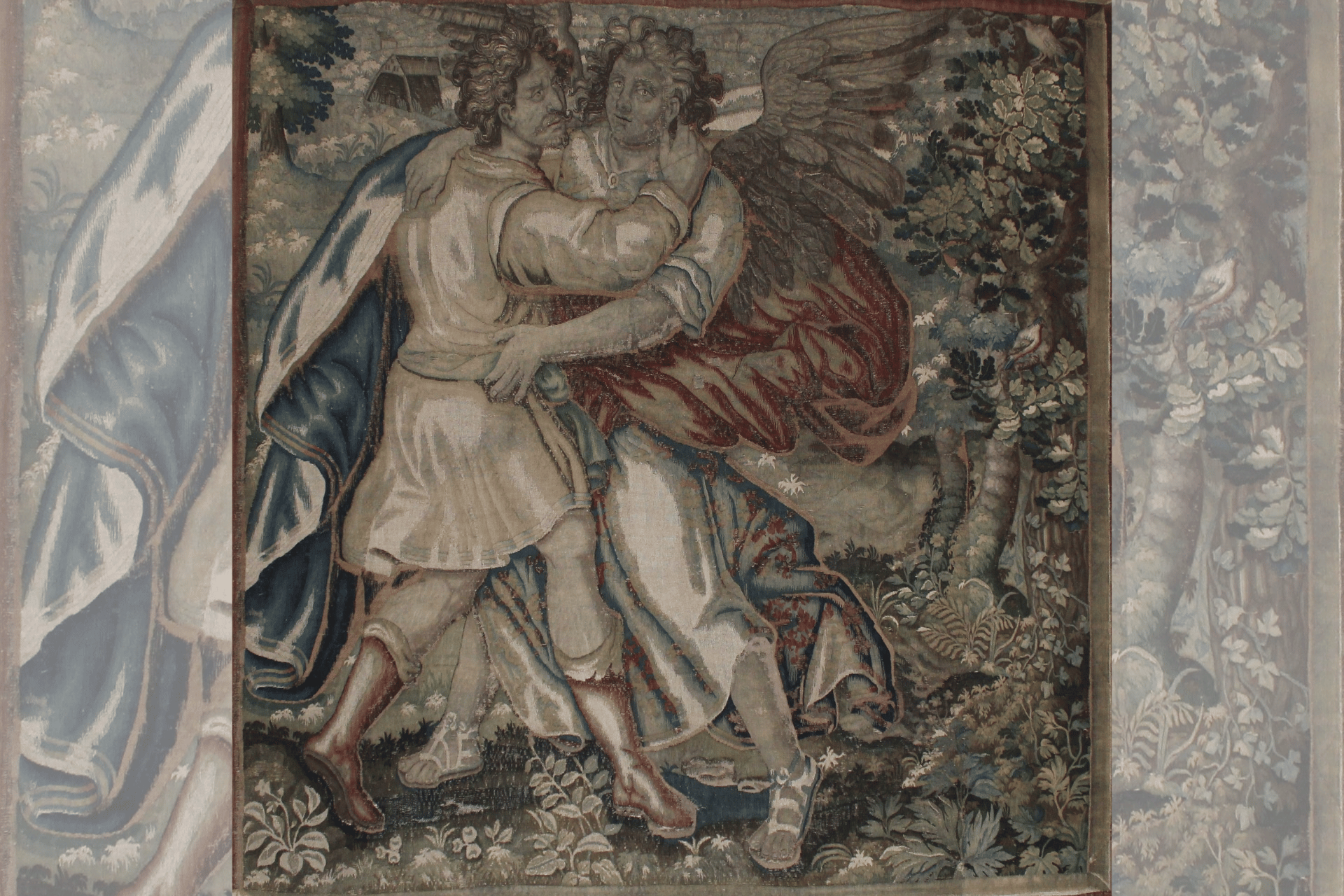 A part of a tapestry showing Jacob wrestling an Angel.